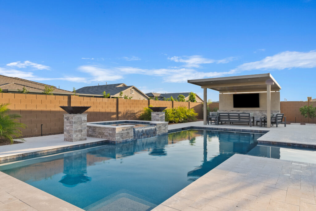 backyard pool and spa with custom firebowls, fire features and landscaping in Queen Creek.